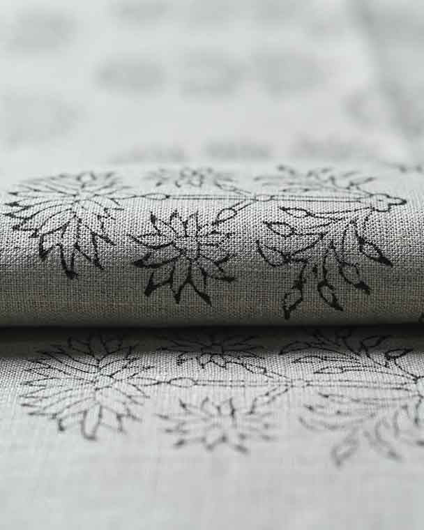 Gray fabric with black floral patterns