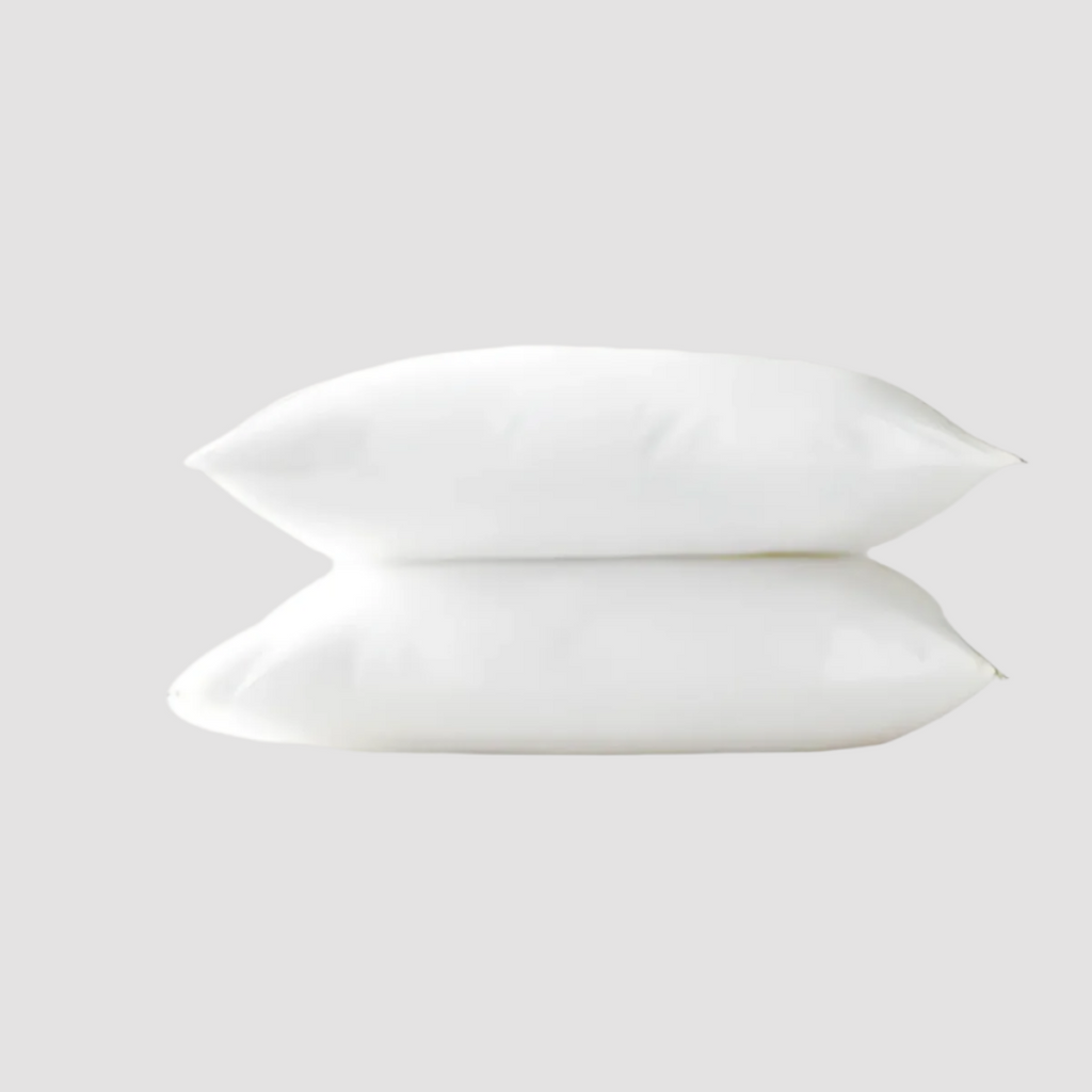 Cozy and resilient fiber-filled pillow insert, offering plush comfort for your home decor. Perfect for throw pillows, bedding, and sofas