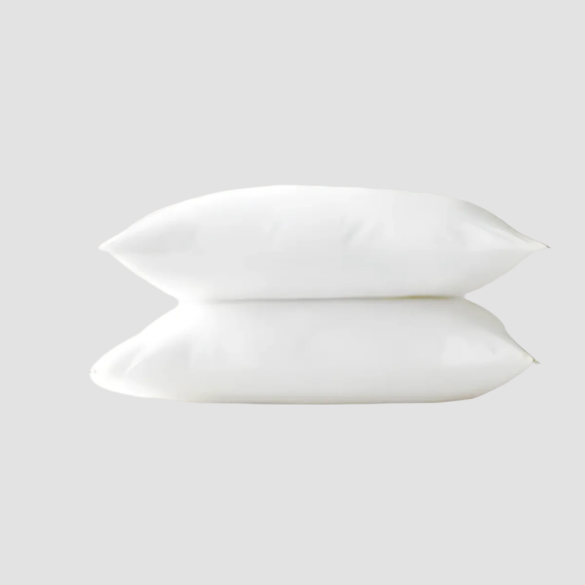 Cozy and resilient fiber-filled pillow insert, offering plush comfort for your home decor. Perfect for throw pillows, bedding, and sofas