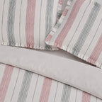 Striped fabric with pink and gray lines on a light gray background