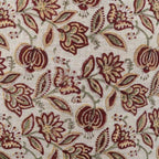 Hand block printed natural linen pillow cover featuring a botanical floral vine motif in red and plum wine.
