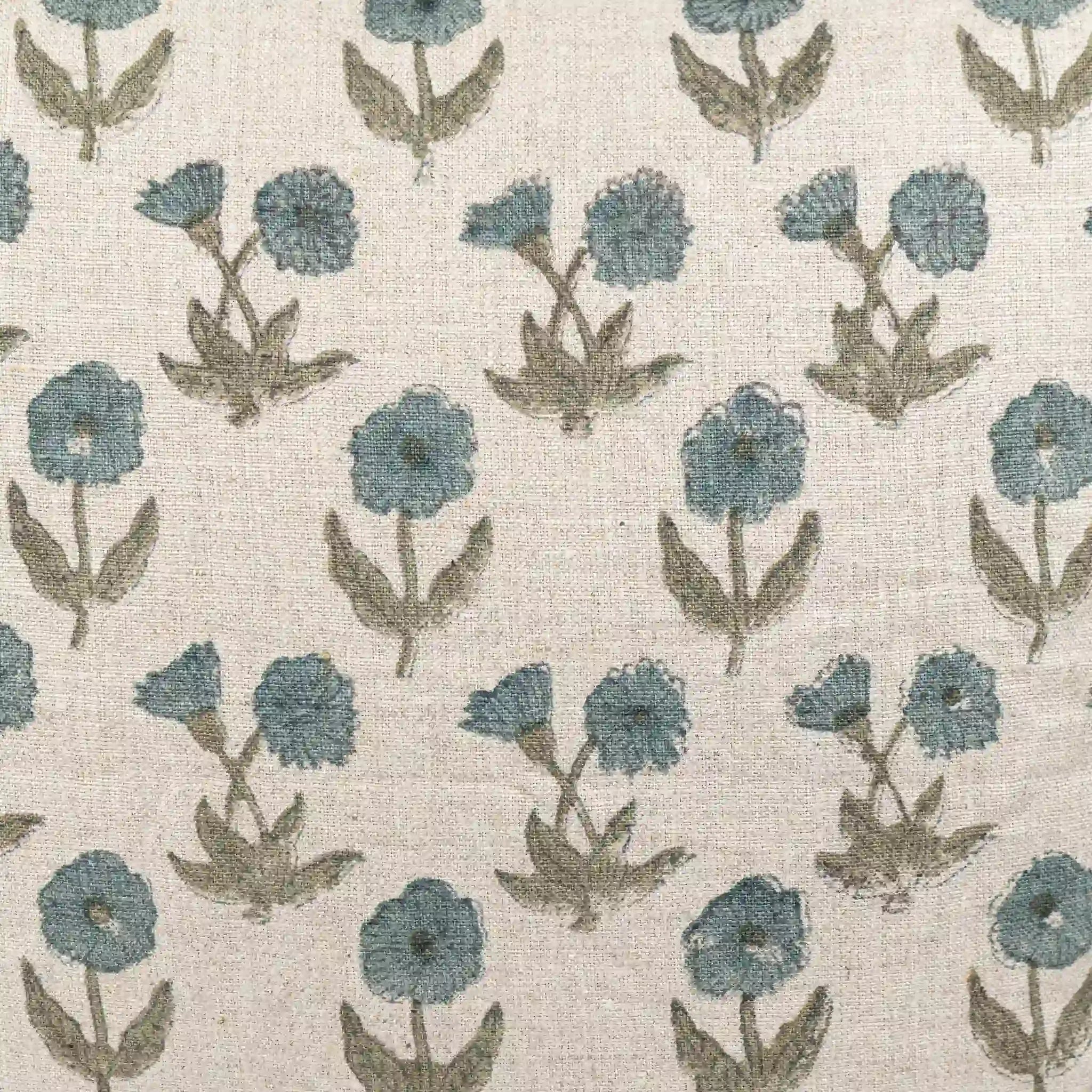 Hand block printed natural linen pillow cover featuring a sage green and blue floral buti motif.