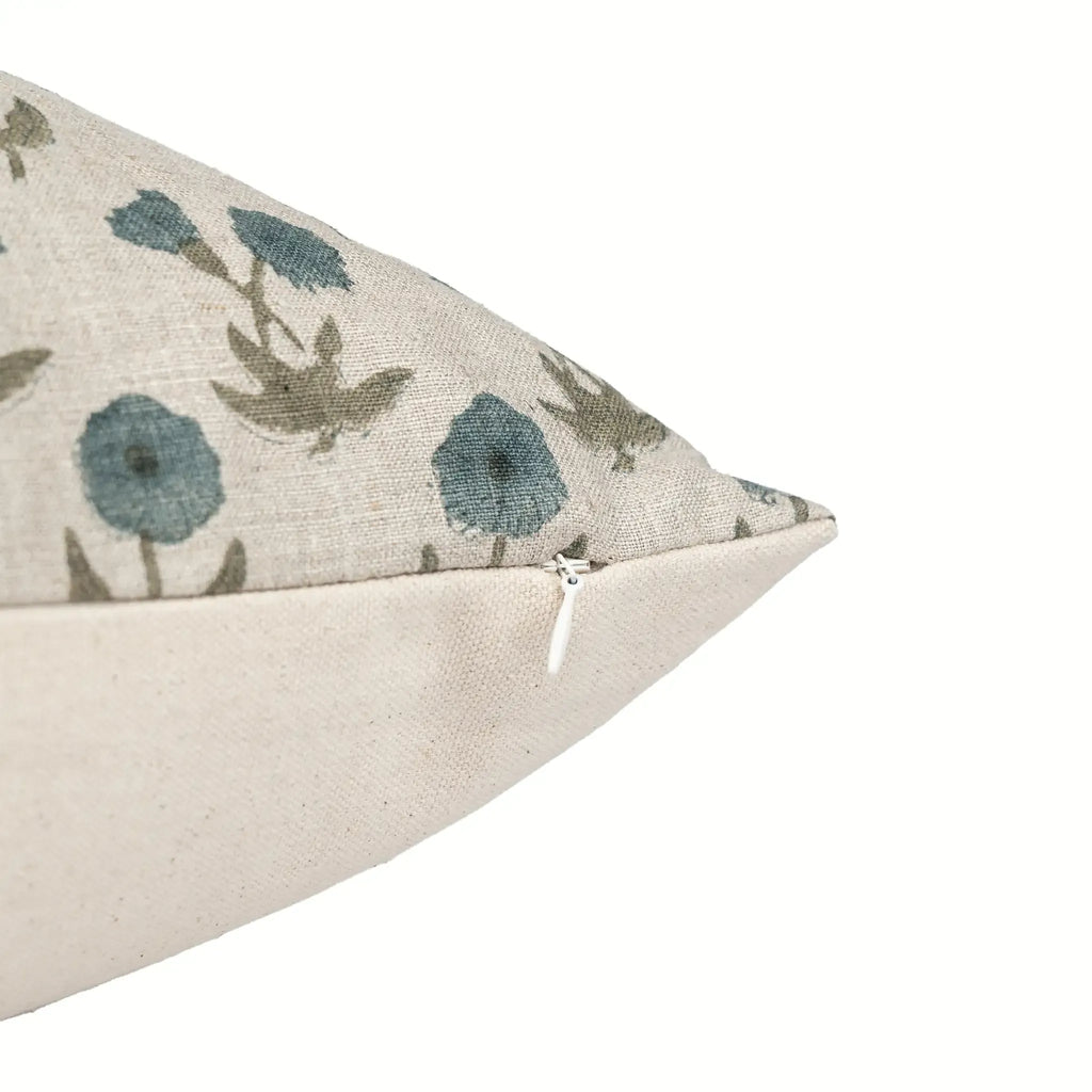 Hand block printed natural linen pillow cover with sage green and blue floral buti motifs and a hidden zipper.