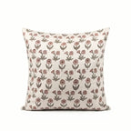 Hand block printed linen pillow cover in natural with pink and plum wine ditsy floral buti motifs.