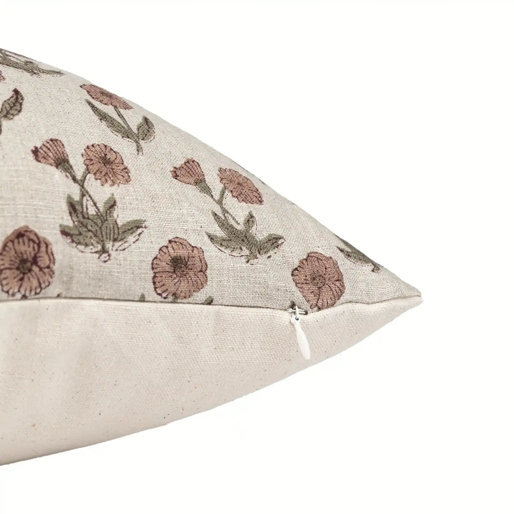 Hand block printed natural linen pillow cover featuring pink and plum floral buti motifs with a hidden zipper closure.