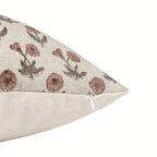 Hand block printed natural linen pillow cover featuring pink and plum floral buti motifs with a hidden zipper closure.