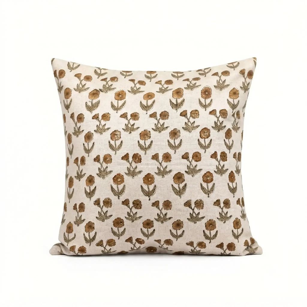 Natural linen pillow cover featuring a hand-blocked mustard and olive floral buti print on a neutral ground.