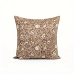 Blush pink linen pillow cover featuring hand-block printed beige and plum wine botanical floral vine patterns.