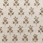 Hand block printed natural linen pillow cover featuring blush pink and olive green floral buti motifs.