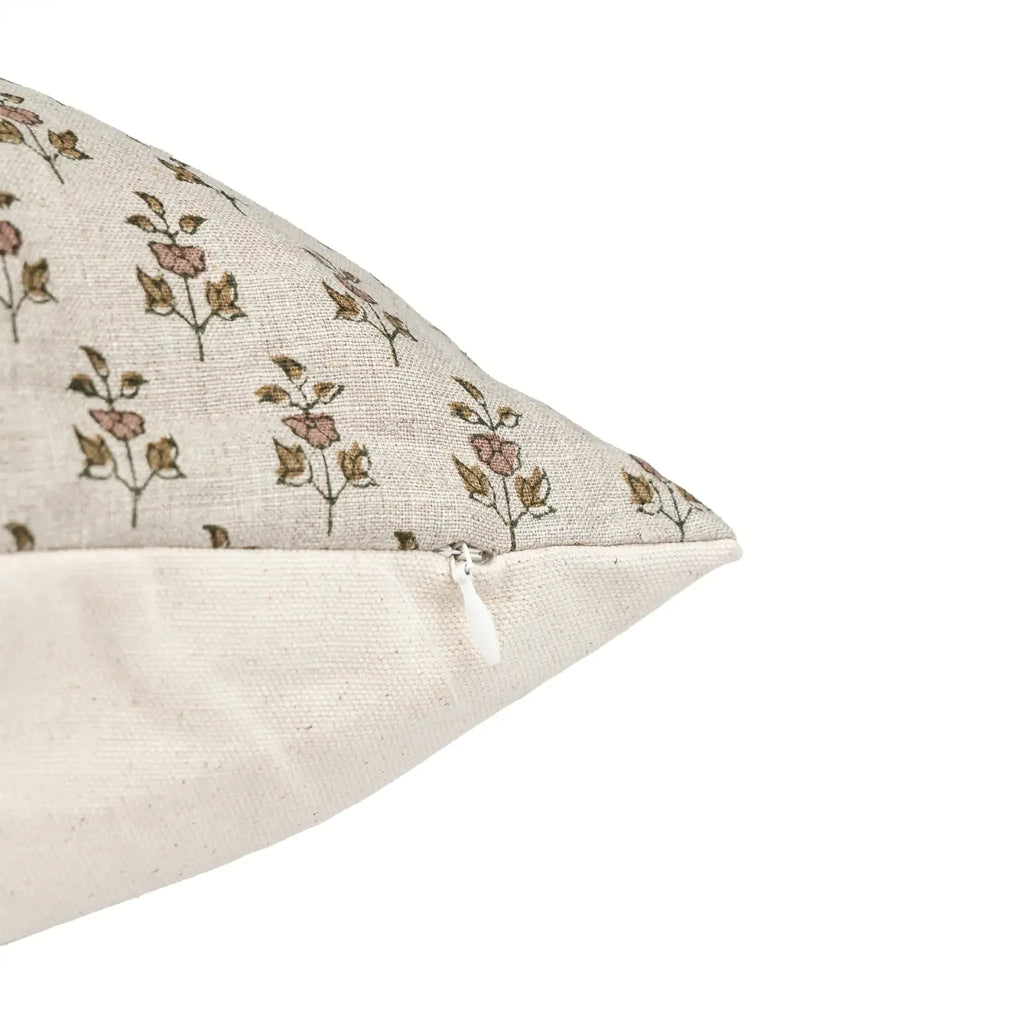 Hand block printed natural linen pillow cover with blush pink and olive green floral buti motifs and side zipper.