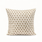 Hand block-printed natural linen pillow cover featuring a sage green and beige floral buti pattern.