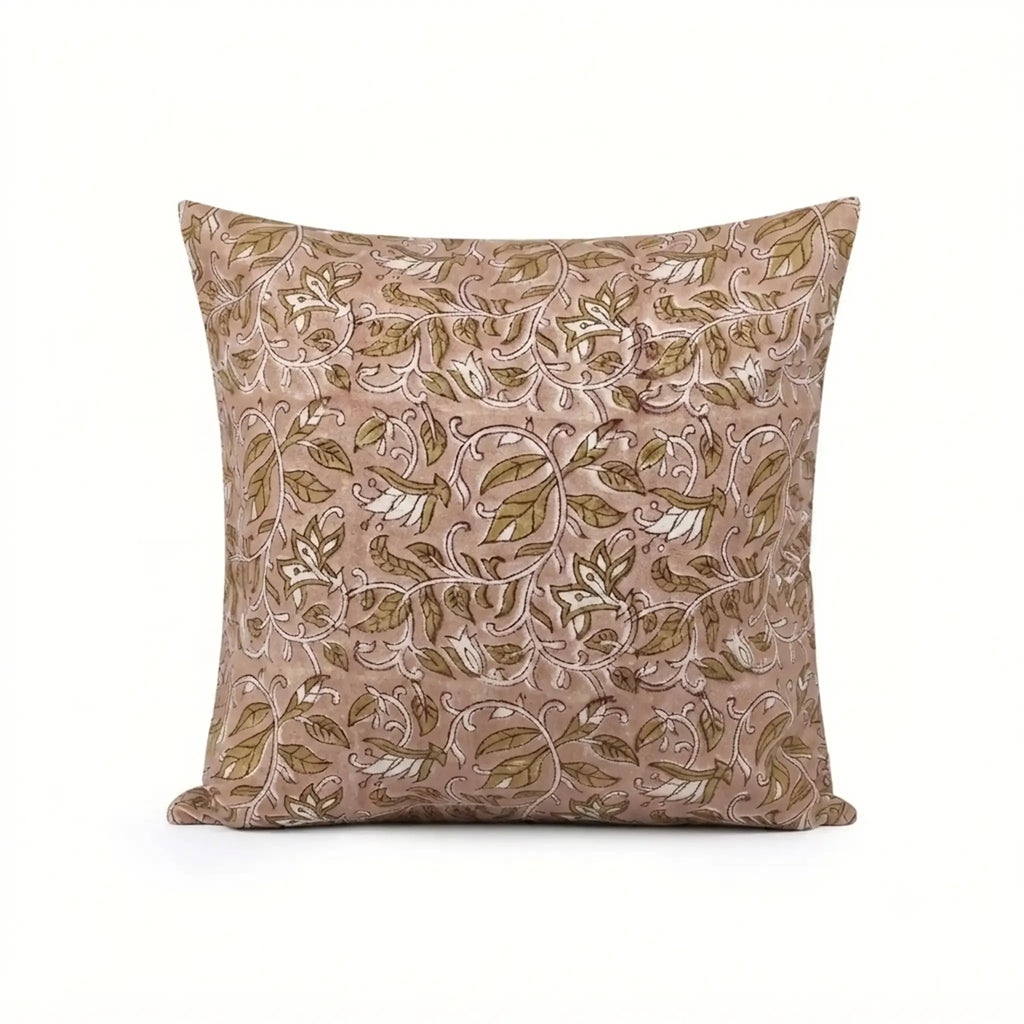Hand block printed linen pillow cover in dawn pink with beige and plum wine floral vine motifs.
