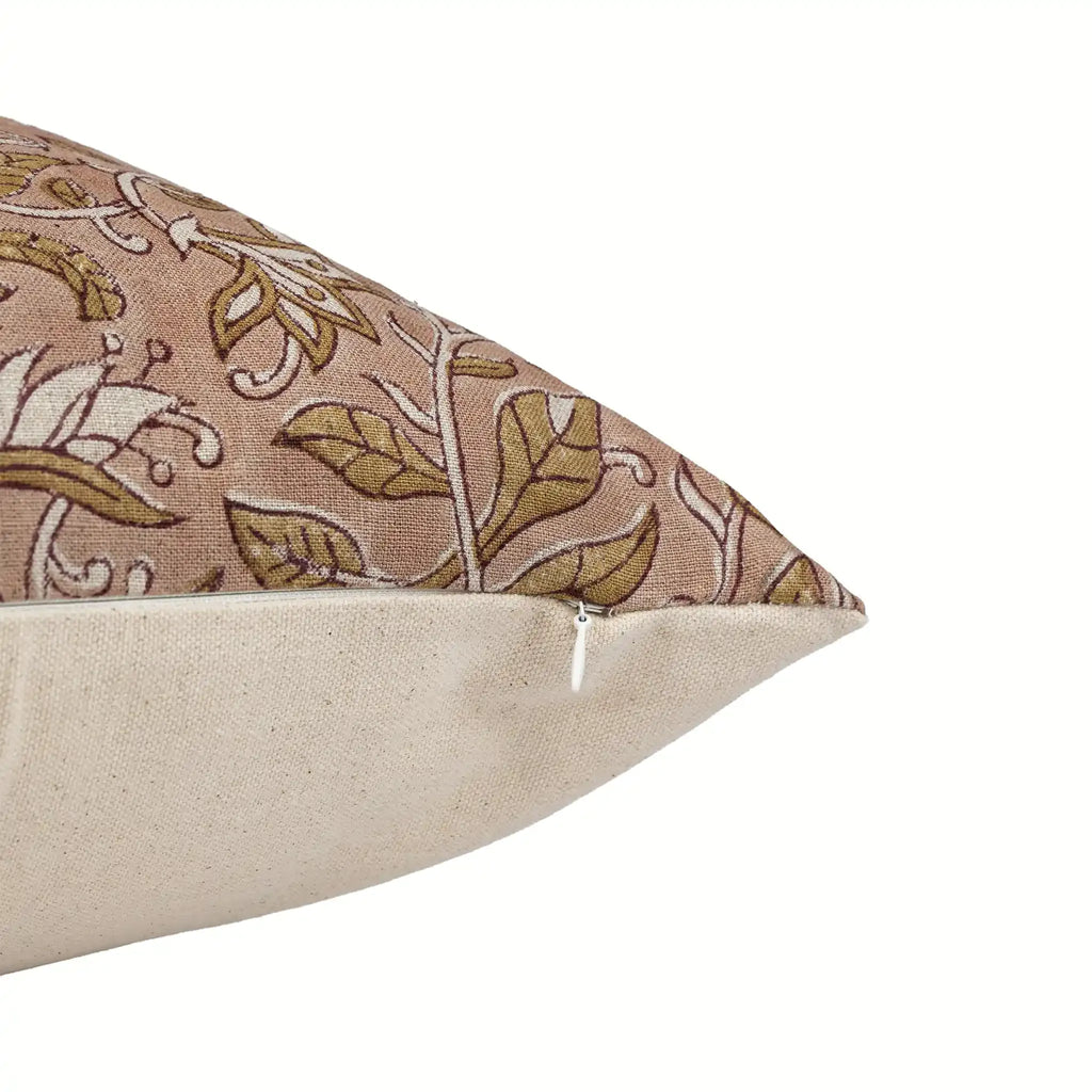 Hand block printed linen pillow cover in dawn pink, beige, and plum wine with a floral vine pattern and hidden zipper.