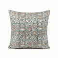 Hand block printed linen pillow cover in ice blue with blush pink floral vine motifs and blue outlines.