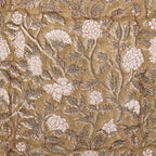 Hand block printed beige linen pillow cover with pale green floral vines and red outlines.