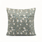 Hand block printed ice blue linen pillow cover featuring a pale green botanical floral vine pattern.