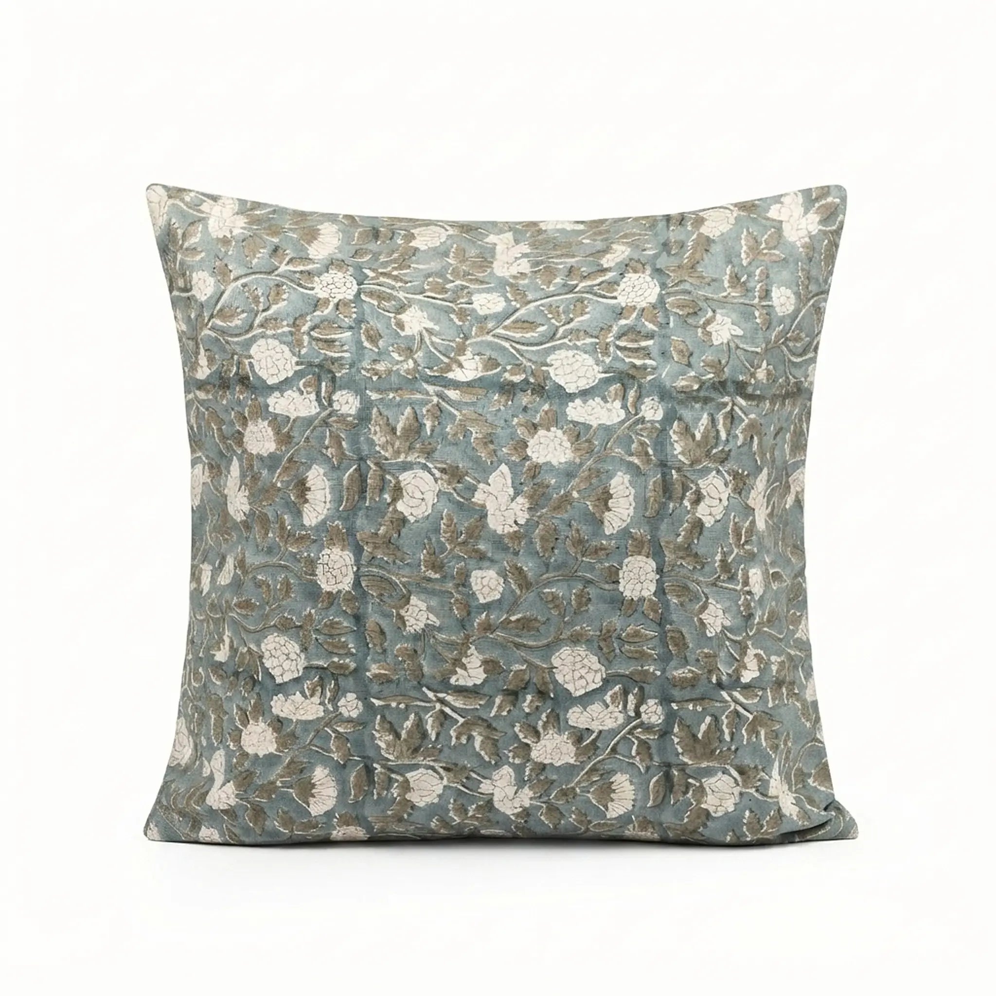 Hand block printed ice blue linen pillow cover featuring a pale green botanical floral vine pattern.