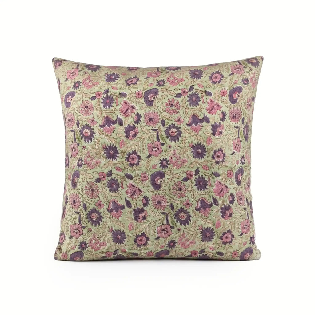 Hand block printed sage green linen pillow cover with purple and olive floral vine motifs.
