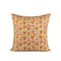 Hand block printed linen pillow cover in lemon yellow with orange and dusk orange botanical floral vine patterns.