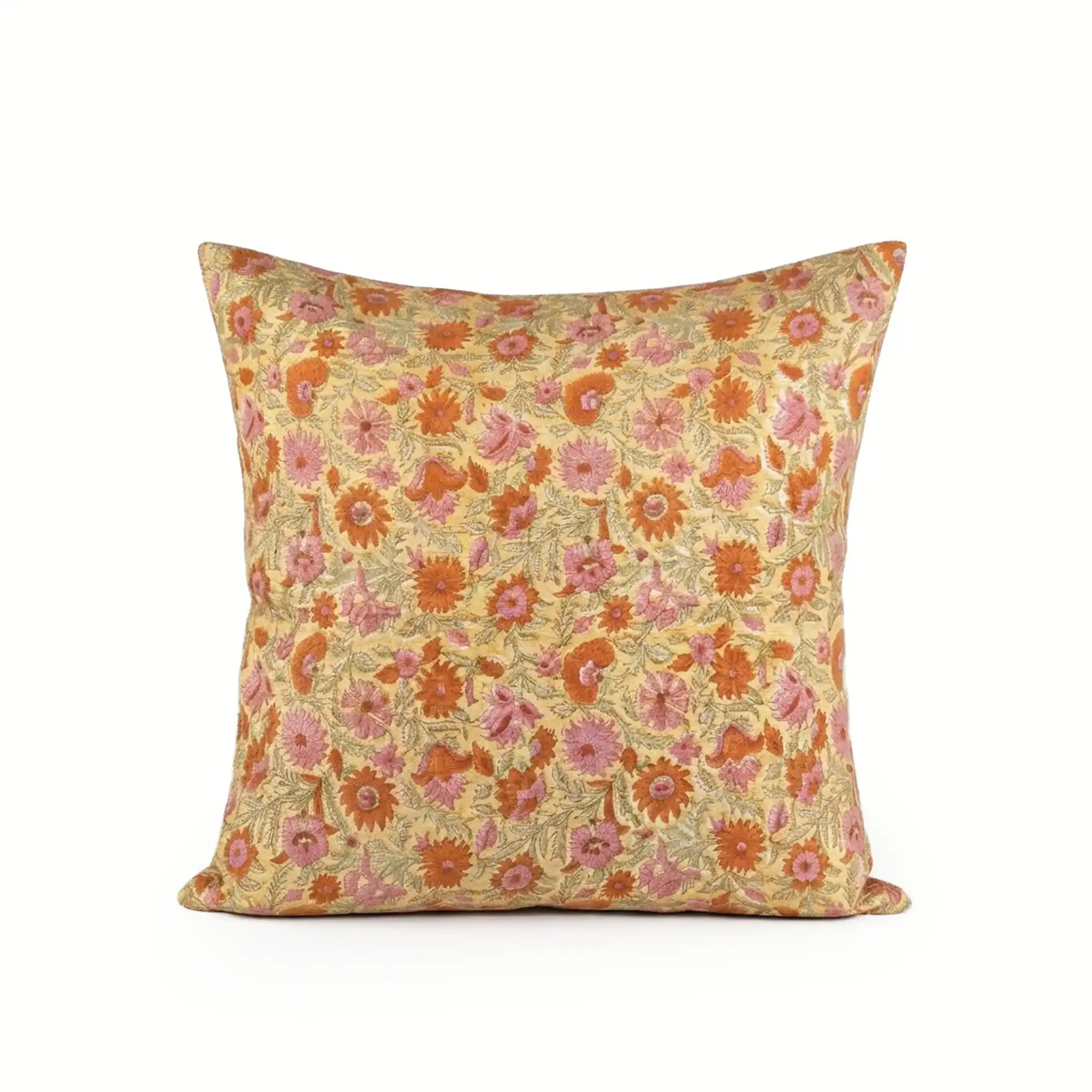 Hand block printed linen pillow cover in lemon yellow with orange and dusk orange botanical floral vine patterns.
