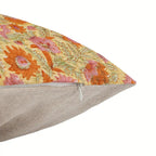 Hand block printed lemon yellow linen pillow cover featuring orange floral vines and a discreet side zipper.