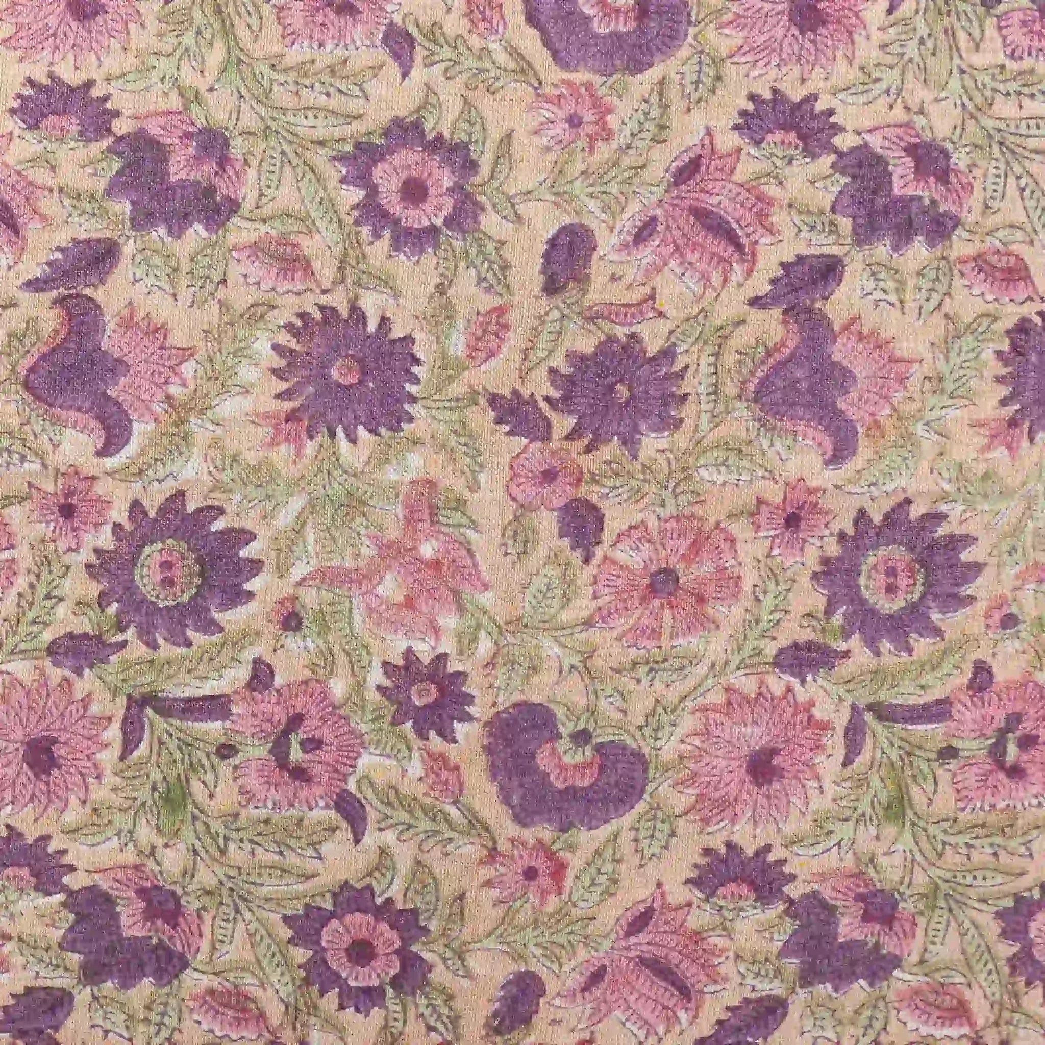 Hand block printed linen pillow cover featuring blush pink and olive green floral vines on a light beige ground.