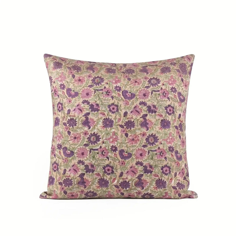 Hand block printed linen pillow cover in light beige with blush pink and olive green floral vine motifs.