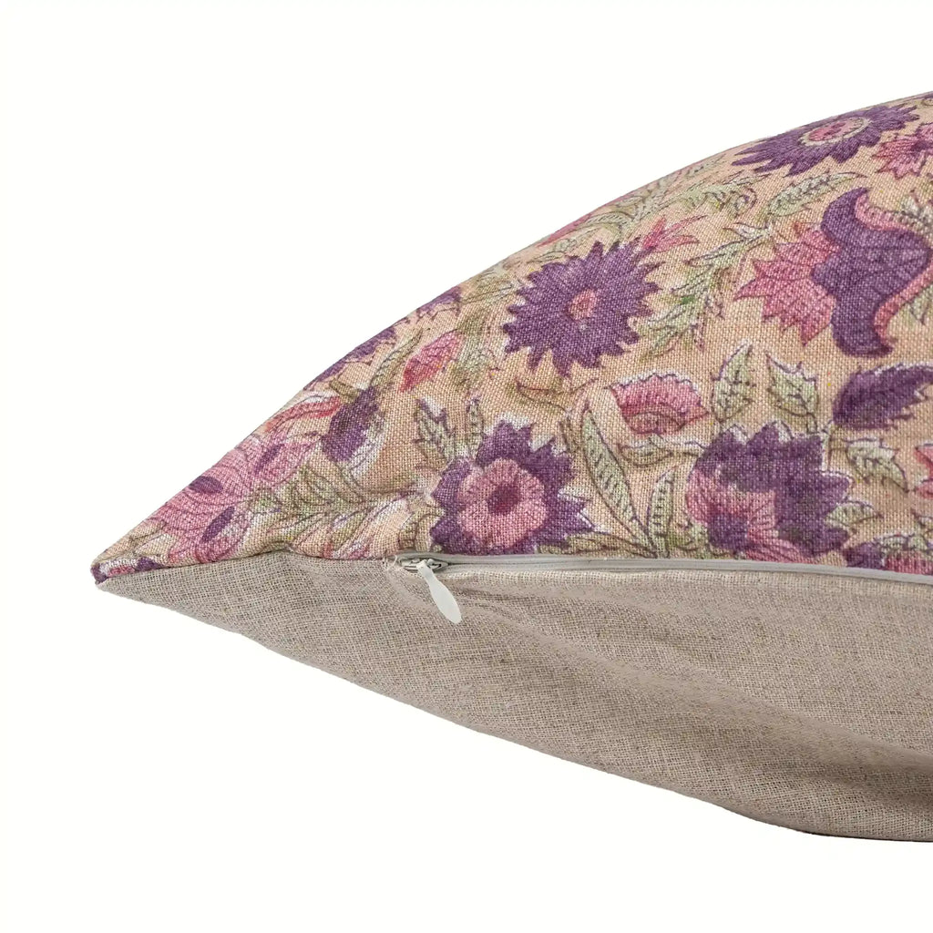 Hand block printed floral linen pillow cover in light beige with blush pink and olive green botanical vine motifs.