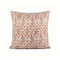 Hand block printed linen pillow cover in natural with dusk orange and brown botanical floral vine motifs.