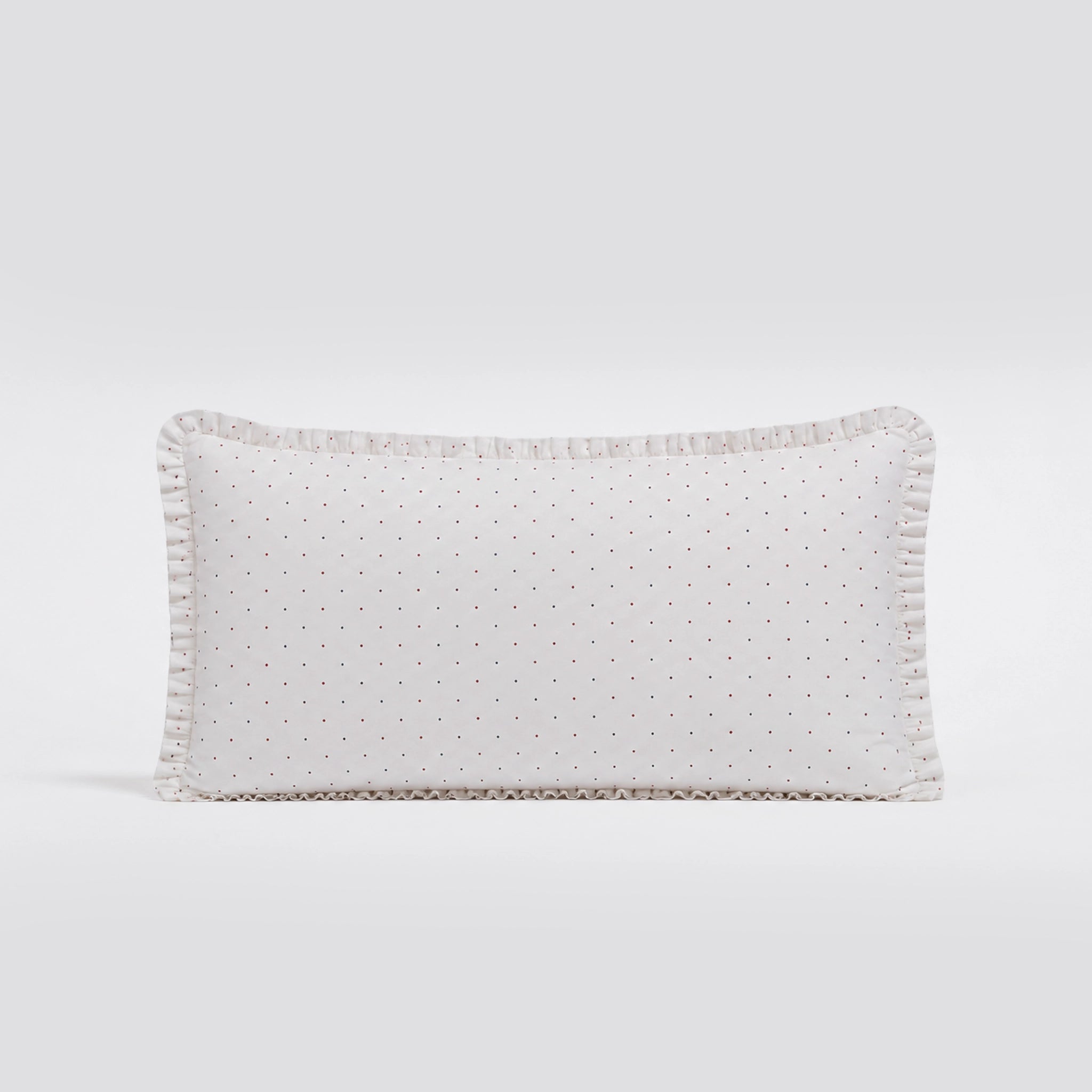 Rectangular pillow with a subtle pattern on a light gray background