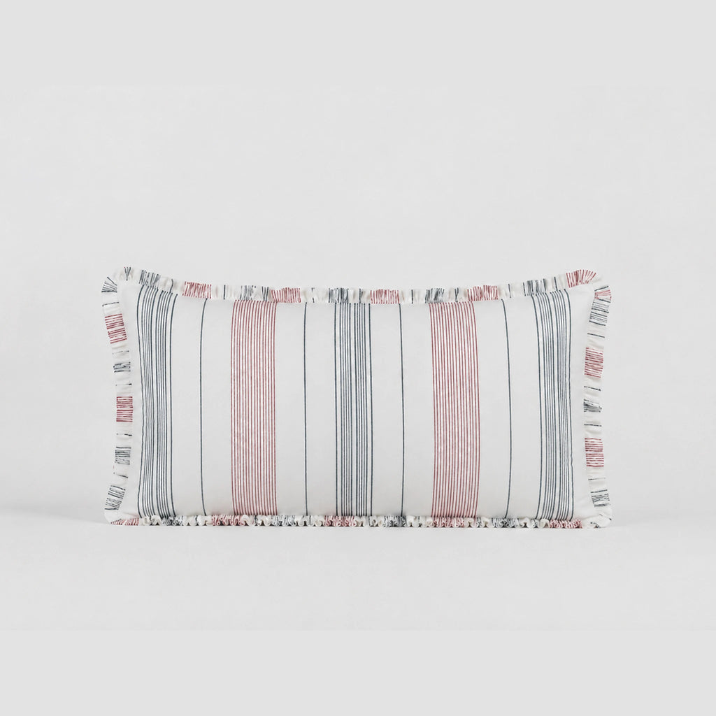 Rectangular pillow with striped pattern on a light gray background