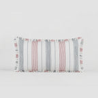 Rectangular pillow with striped pattern on a light gray background