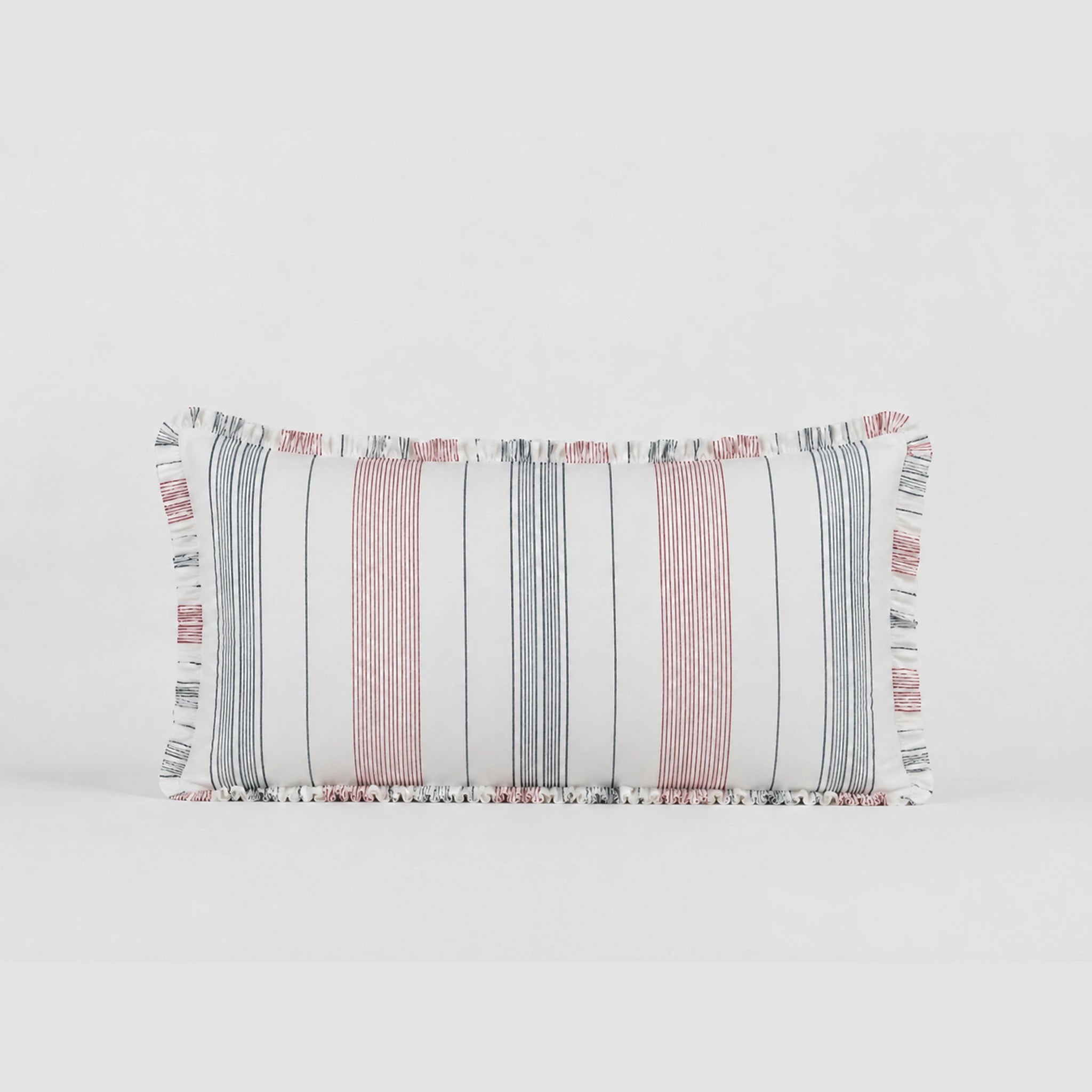 Rectangular pillow with striped pattern on a light gray background