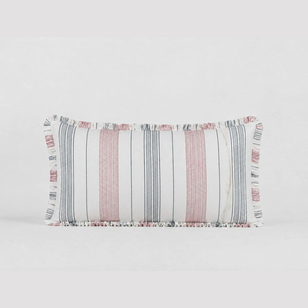 Rectangular pillow with striped pattern on a light gray background