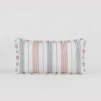 Rectangular pillow with striped pattern on a light gray background