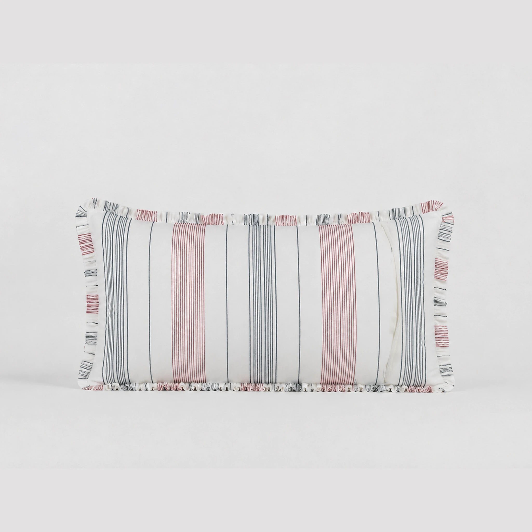 Rectangular pillow with striped pattern on a light gray background