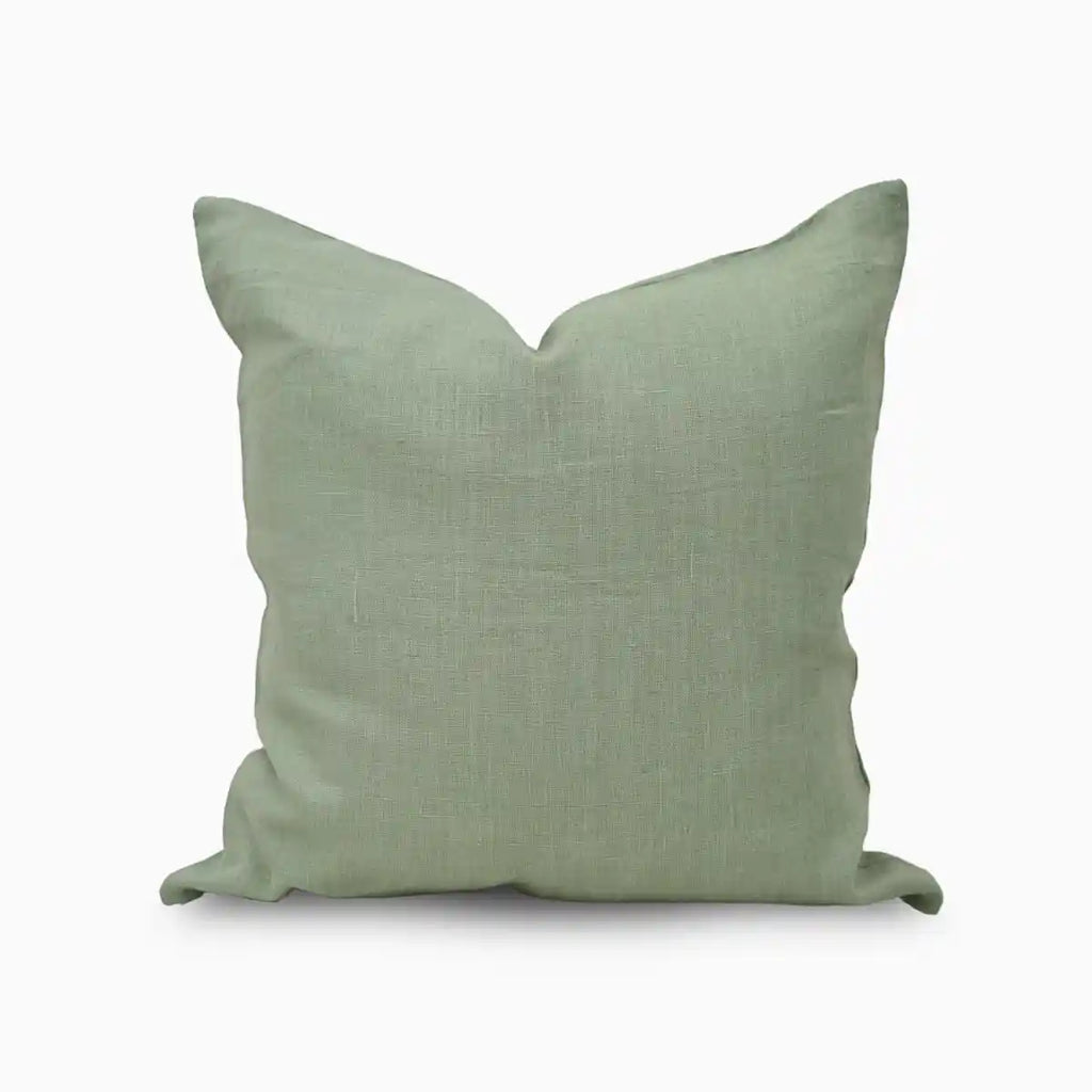 Green pillow on a white background