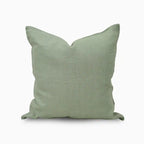 Green pillow on a white background