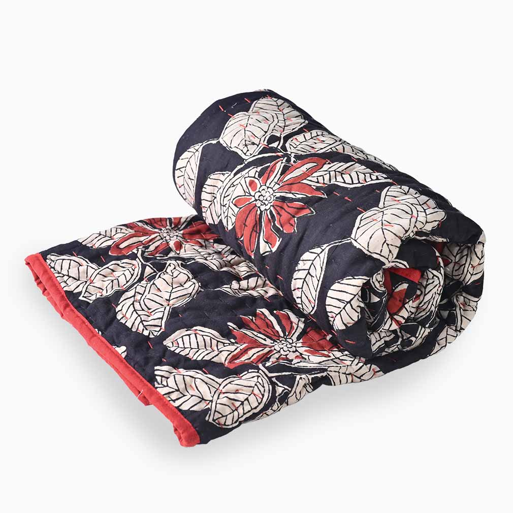 Roll of fabric with floral pattern on a white background