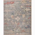 Decorative rug with abstract floral pattern on a gray background