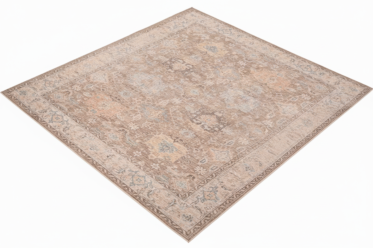 Patterned rug with beige and brown tones on a white background