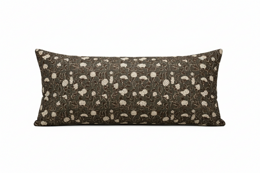 Decorative pillow with floral pattern on a white background