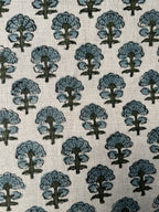 Pattern of blue trees on a beige background