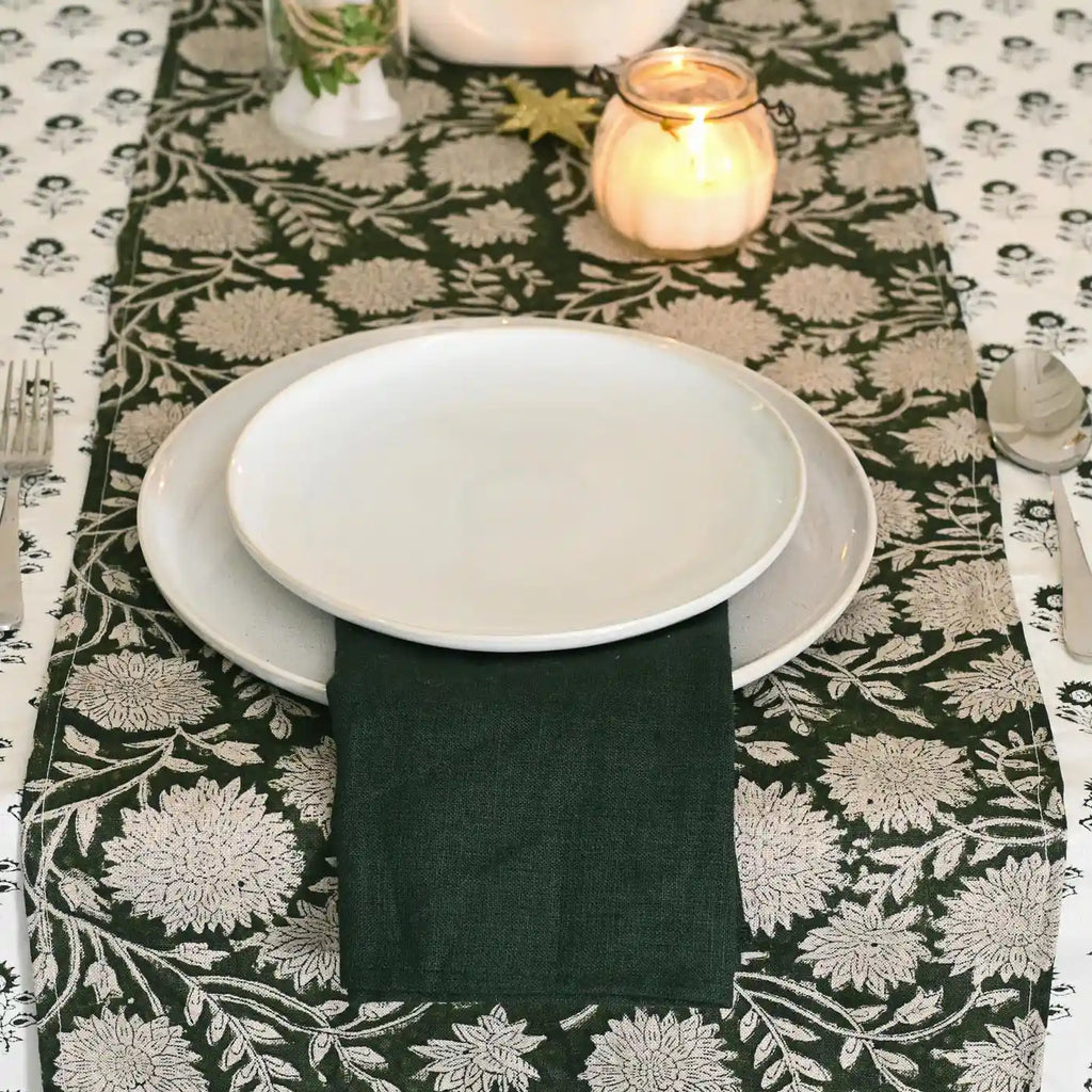 Close‑up of solid green linen fabric texture