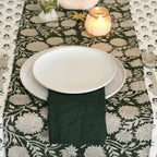 Close‑up of solid green linen fabric texture