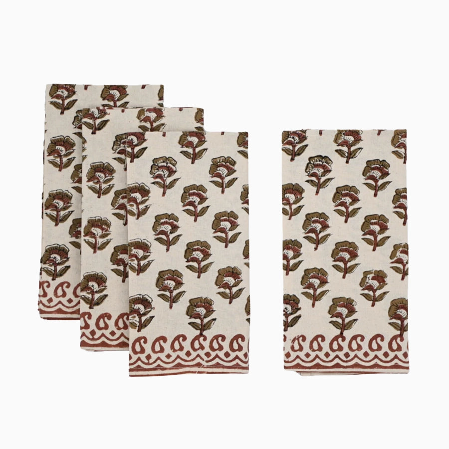 Cotton floral buti block print napkins in rust on beige fabric