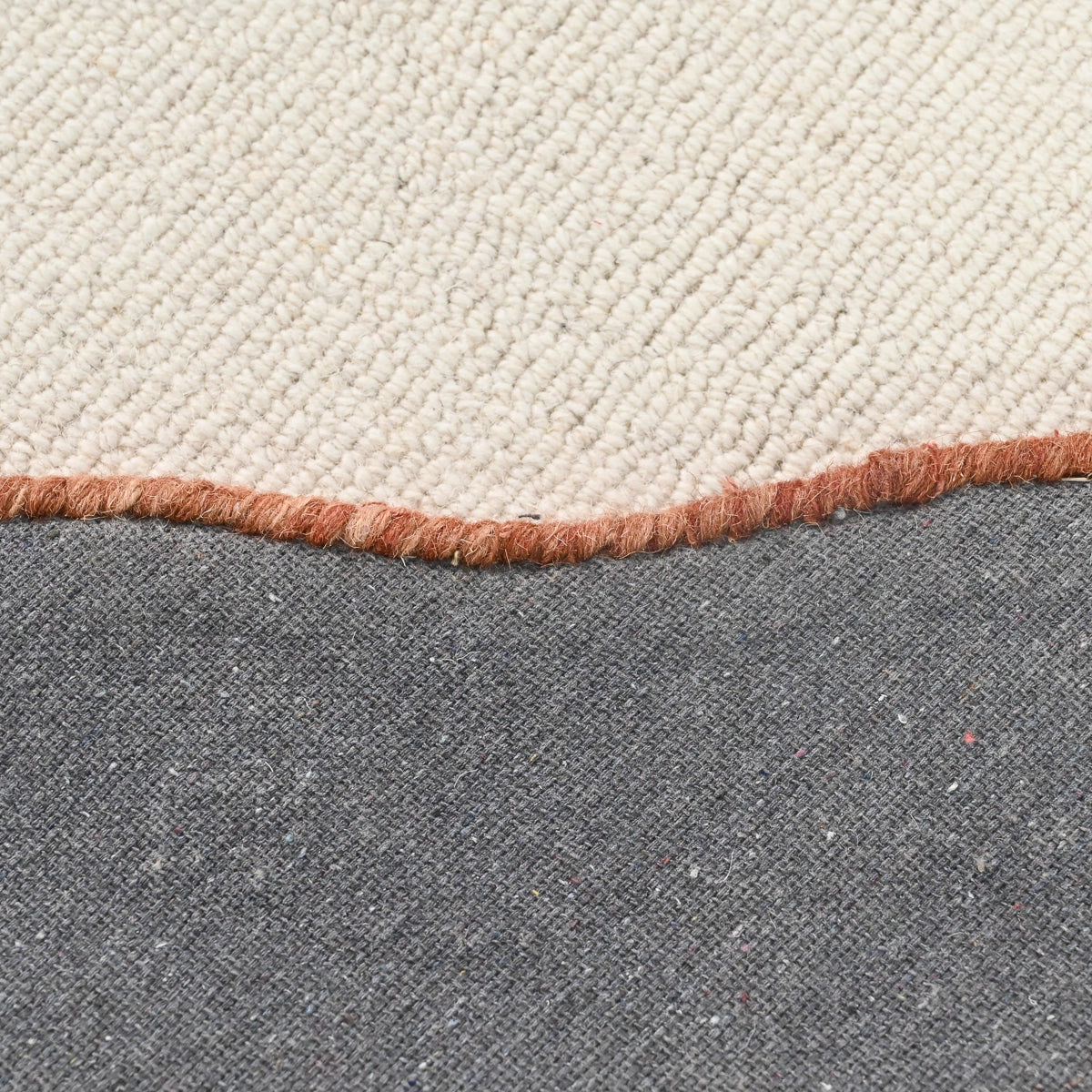 Cradle Hand-Tufted Asymmetrical  Rug