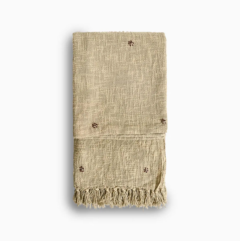 Tan Dust textured embroidery throw blanket with fringe on a white background