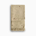 Tan Dust textured embroidery throw blanket with fringe on a white background