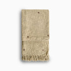 Tan Dust textured embroidery throw blanket with fringe on a white background